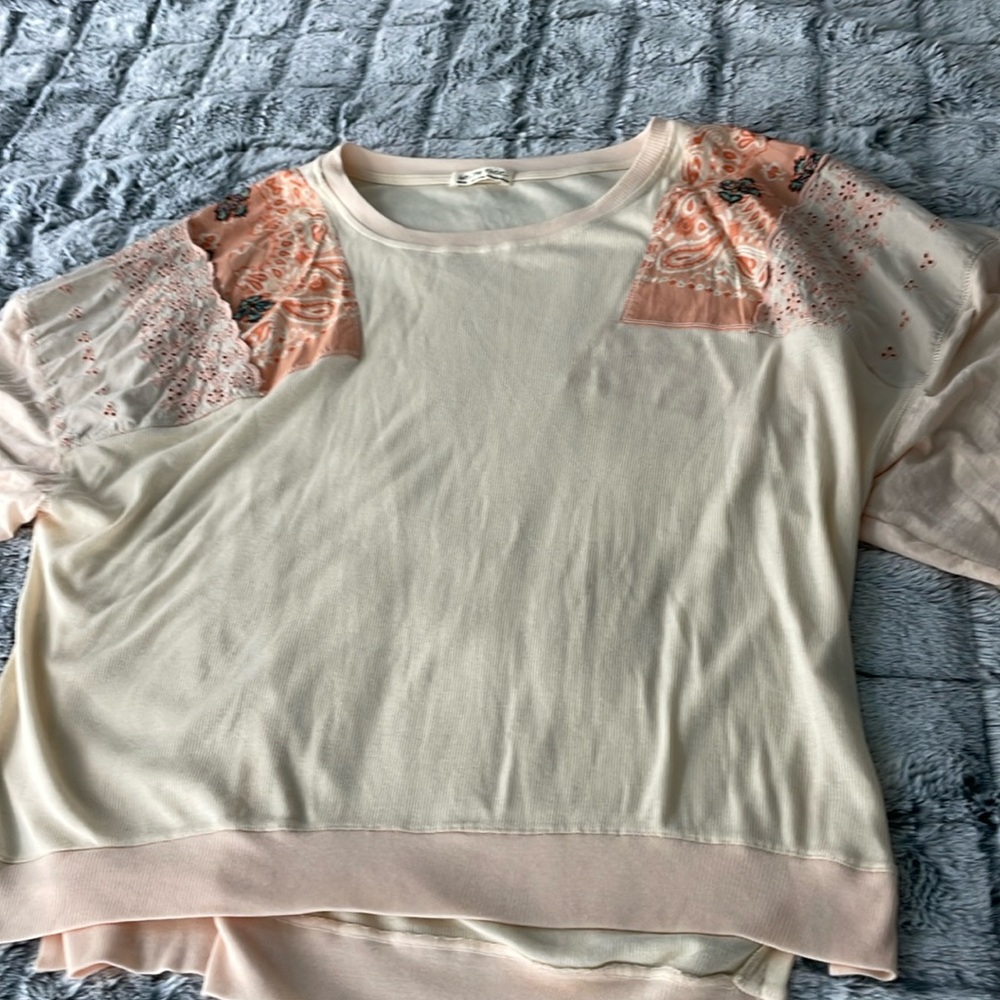 Free People beach color top, a little oversized , nice condition
